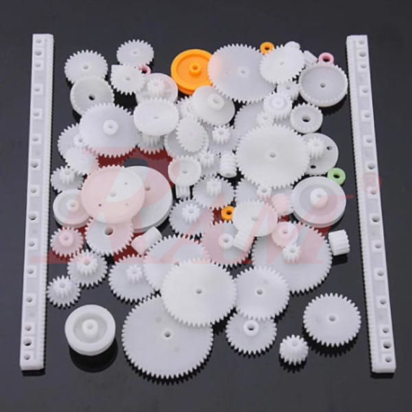 75-piece plastic gear set including crown, spindle, and worm gears, pulleys, and racks